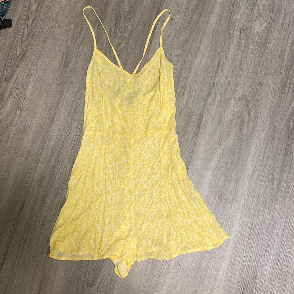 Yellow romper from Forever 21. Comes with a tie around belt.